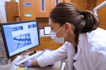 Vaughn_Familty_dental_dentist_Independence_MO_working on an dental x ray